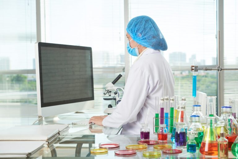 Researcher working with data in a modern lab