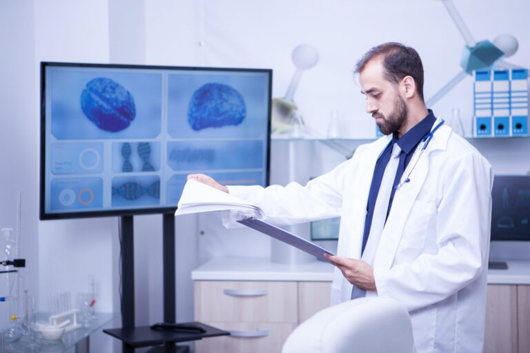 Specialist reviewing brain scan results