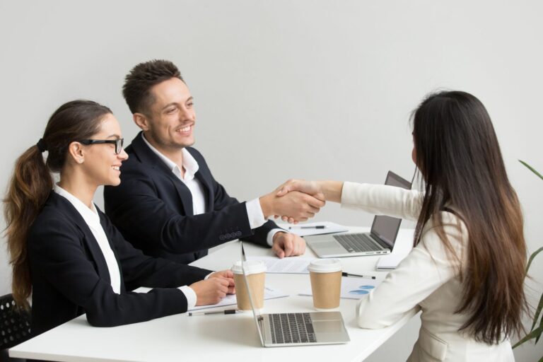 Business partners agreeing a delivery partnership